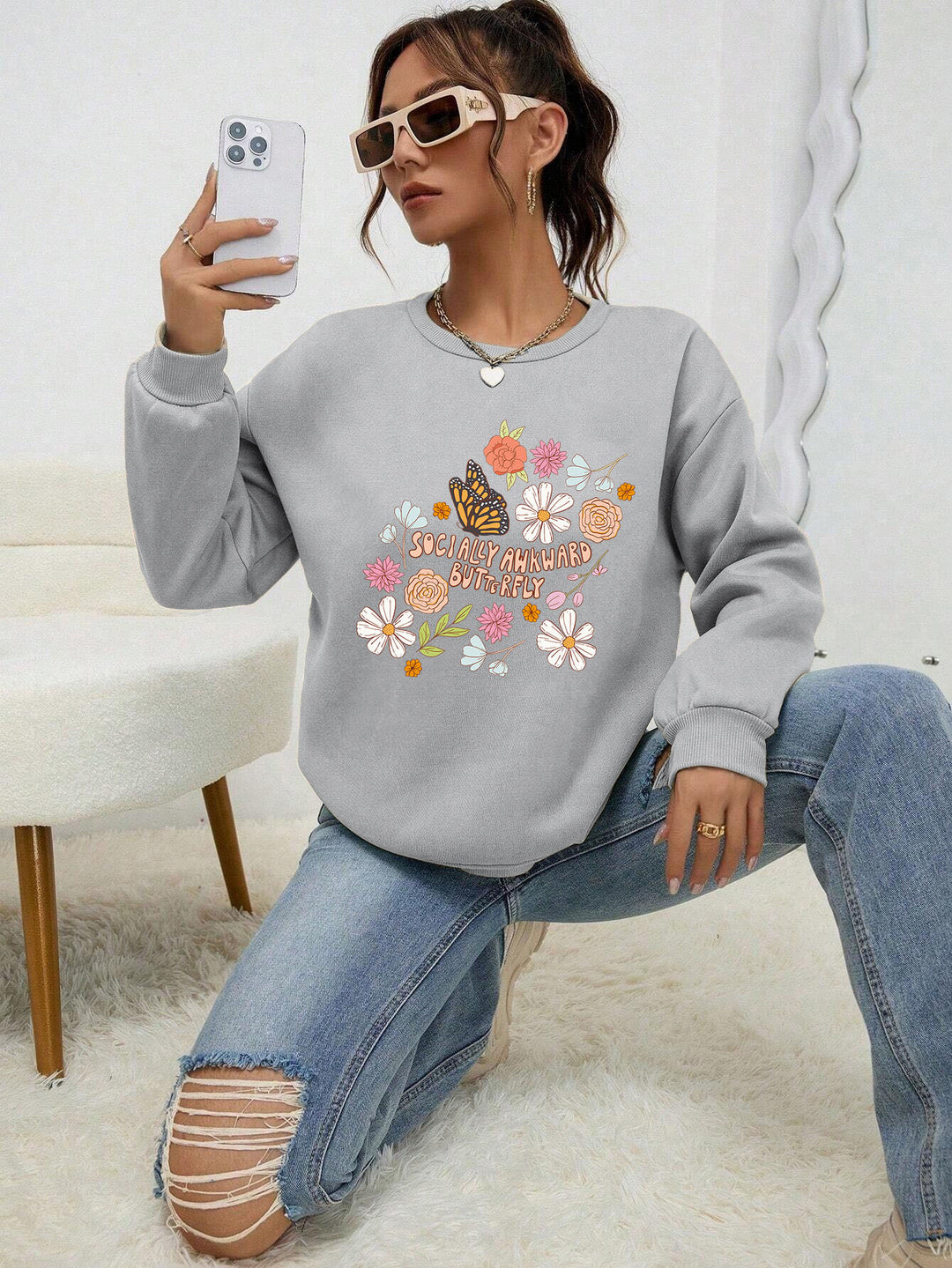 Kvinders sweatshirt med kreativ blomster mønster og inspirerende print Stilla