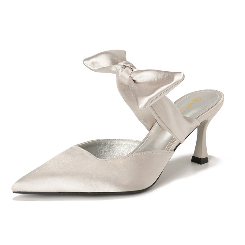 Dame Sling-pumps med elegant sløjfeapplikation og spids design Stilla