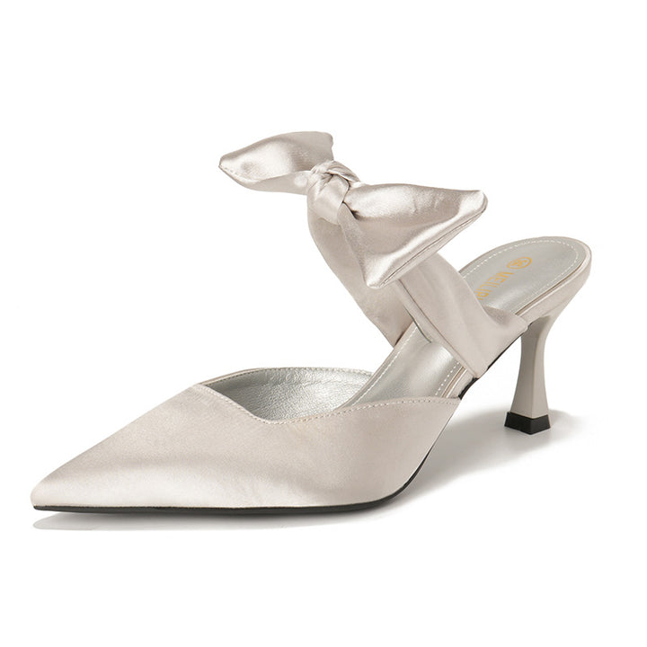Dame Sling-pumps med elegant sløjfeapplikation og spids design Stilla