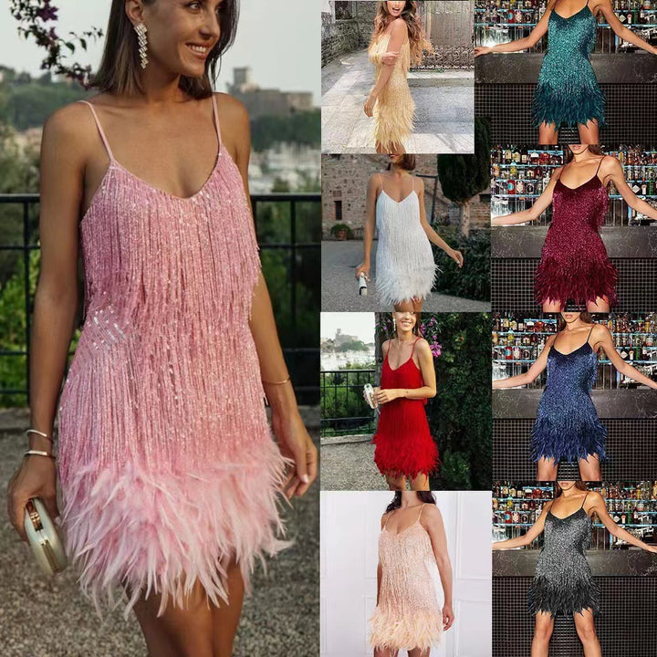 Kvinders glitrende minikjole med frynse detaljer og off-shoulder design