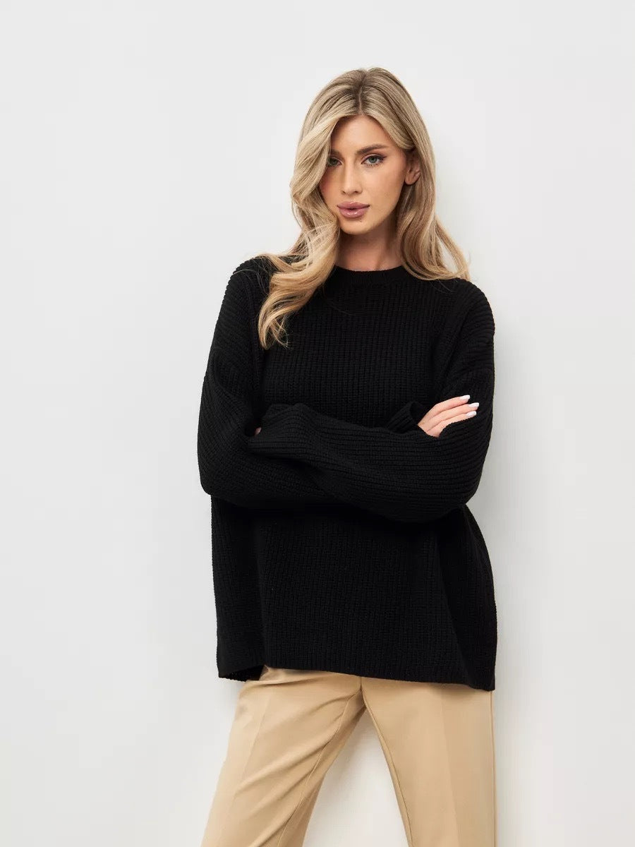 Kvinders afslappede oversized strikket sweater med åbne ærmekanter og let ribbestrikket mønster Stilla