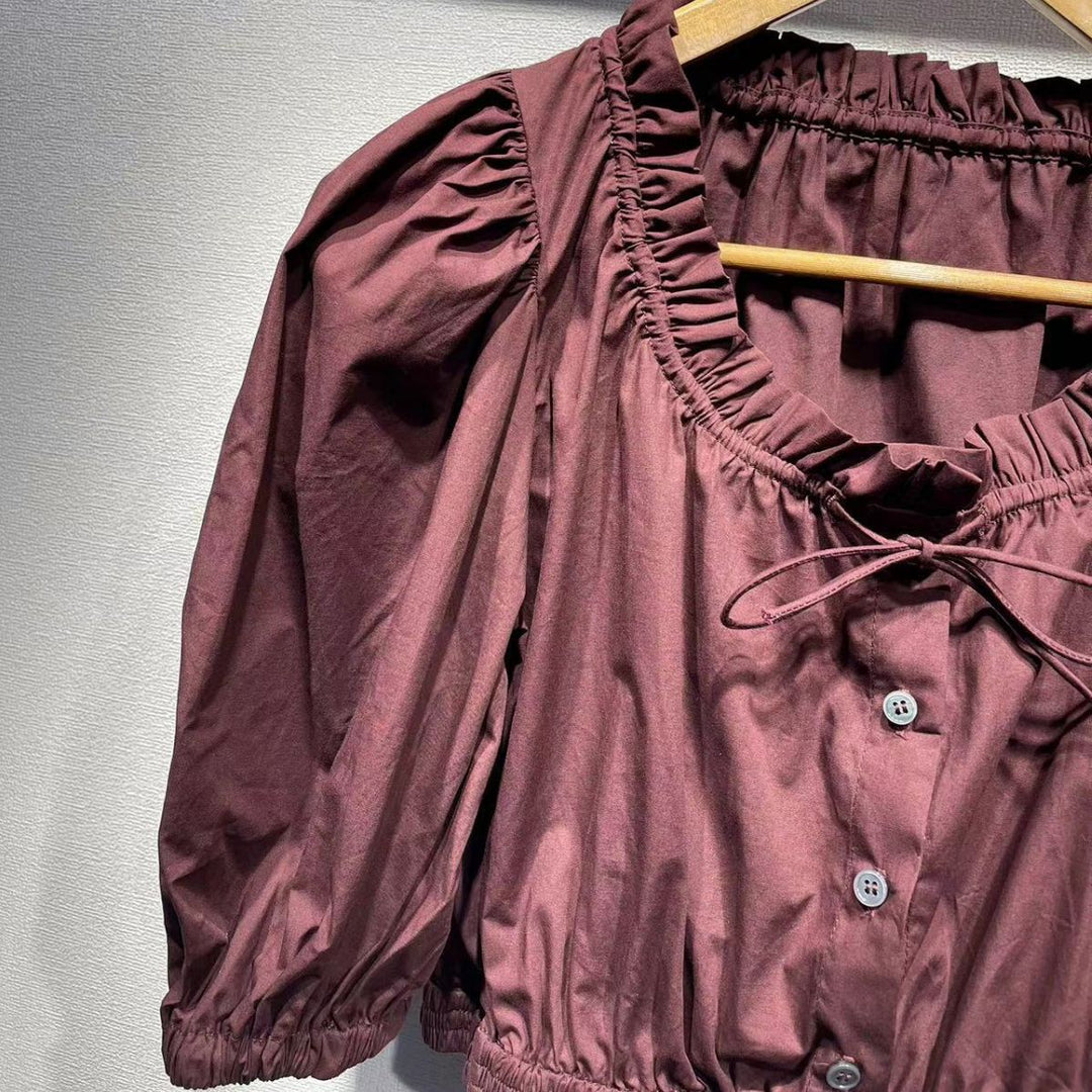 Dame kortærmet bluse med elastisk kant og romantiske puffærmer Stilla