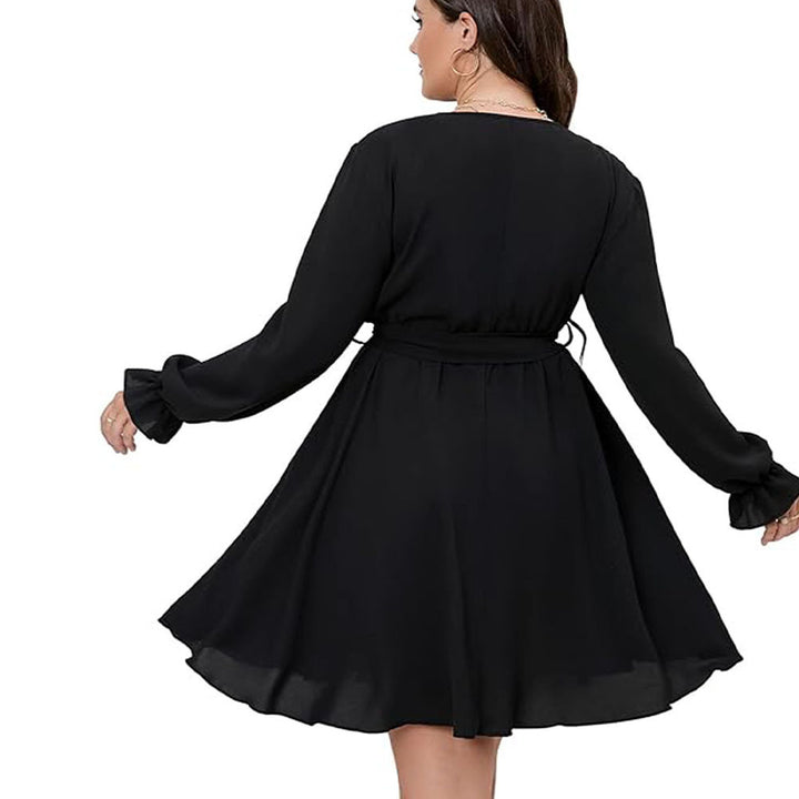 Dame wrapkjole med elegant taljering og feminine puffærmer Stilla
