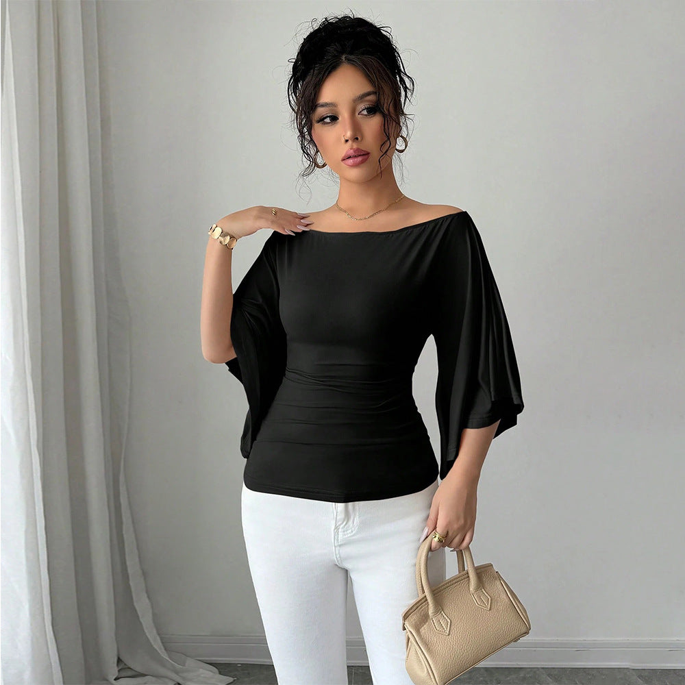 Kvinders elegante off-shoulder top med brede ærmer og figursyet pasform Stilla
