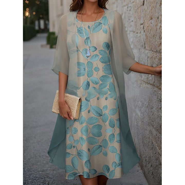 Dame elegant maxikjole med gennemsigtig chiffonoverdel og blomsterprint Stilla