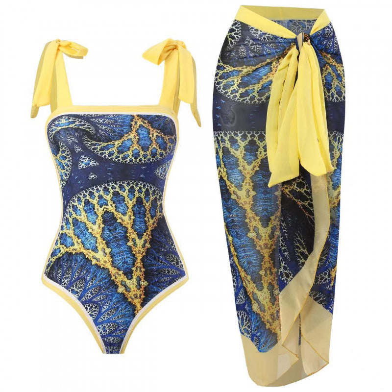 Dame Én-delt Badedragt med stilfuld Wrap Skirt og moderigtigt mønster Skovae