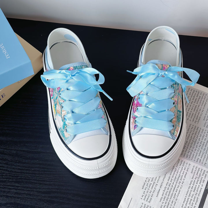 Dame Sneakers med florale accenter og dekorative satin snørebånd Stilla