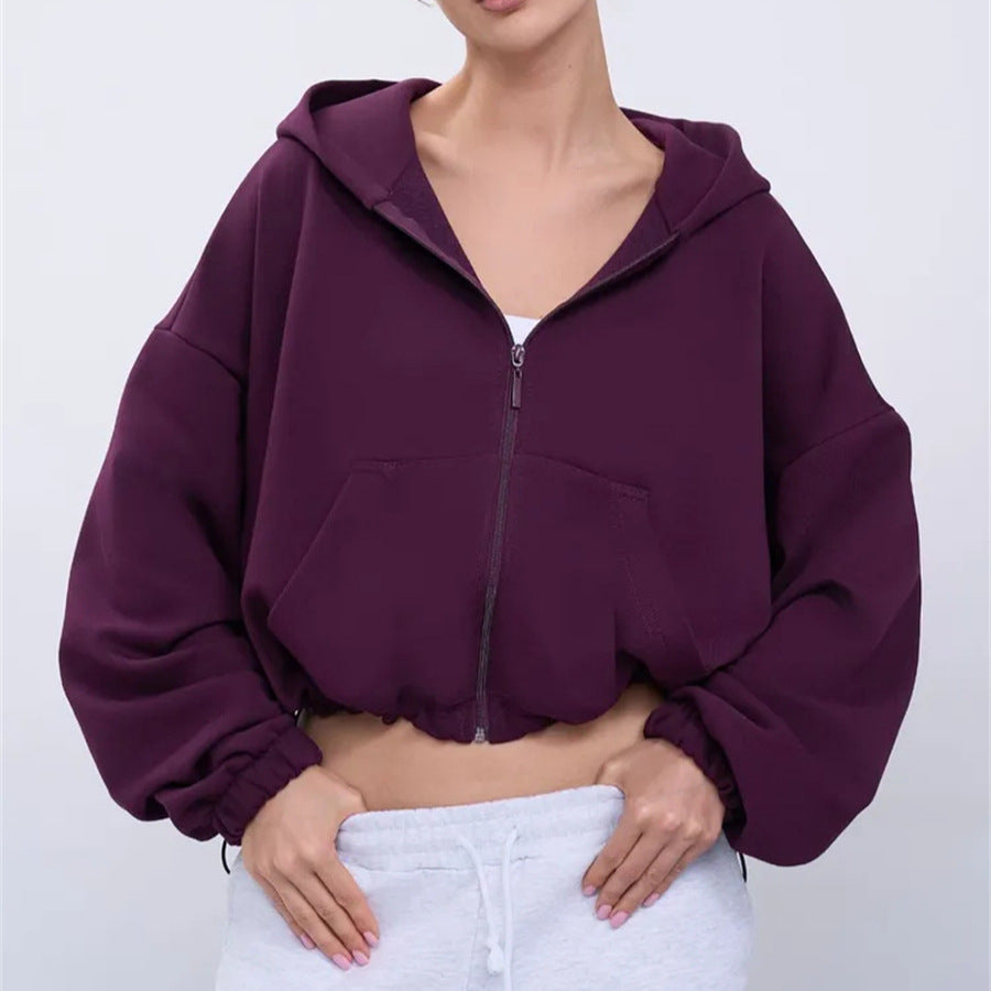 Kvindernes afslappede cropped hoodie med lynlås og brede ærmer Skovae