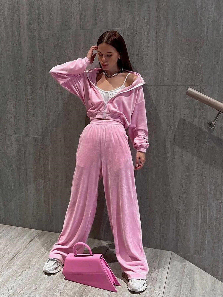 Kvinders fashionable velour sportsdragt med halv lynlås og elastiske manchetter Skovae