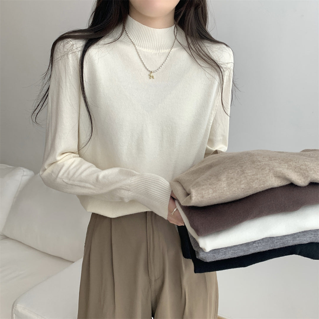 Dame finstrikket sweater med moderne ståkrave og afslappet pasform Stilla