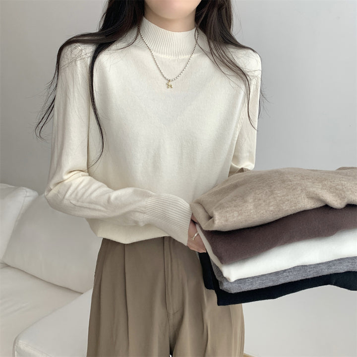 Dame finstrikket sweater med moderne ståkrave og afslappet pasform Stilla