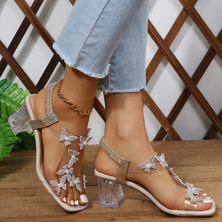 Dame glamourøse sandaler med funklende sommerfugledetaljer og transparent blokhæl Stilla