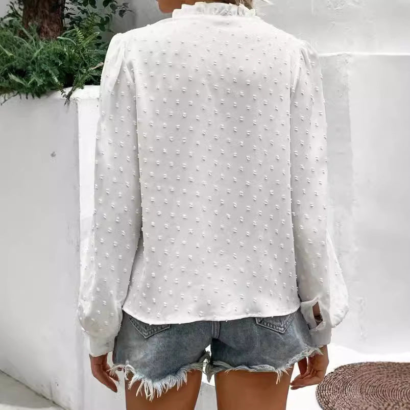 Damebluse med struktureret punktedesign og spidse detaljer Stilla