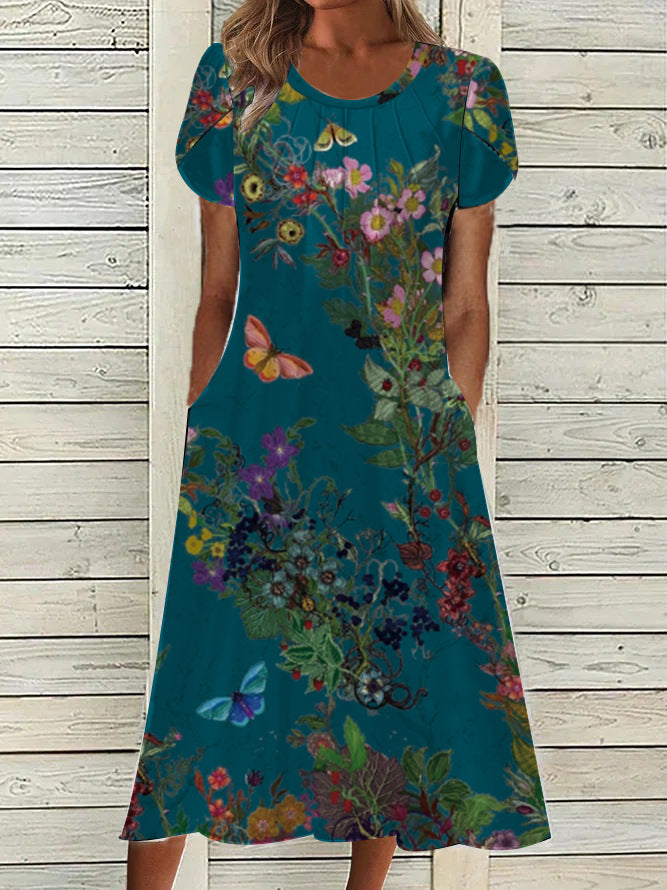 Dame maxikjole med botanisk blomsterprint og praktiske lommer Stilla
