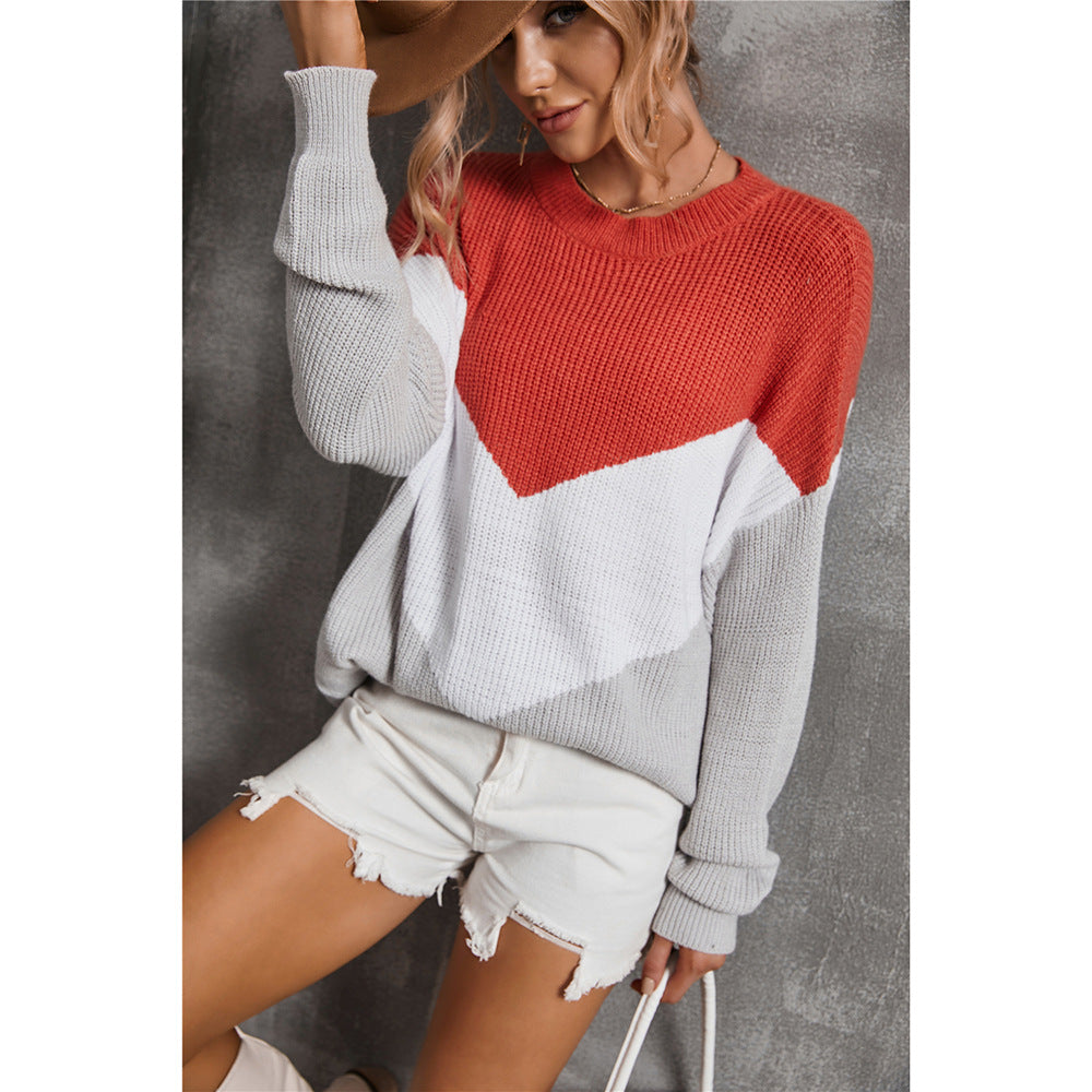 Dame mode strikket sweater med iøjnefaldende V-hals og grafisk design Stilla