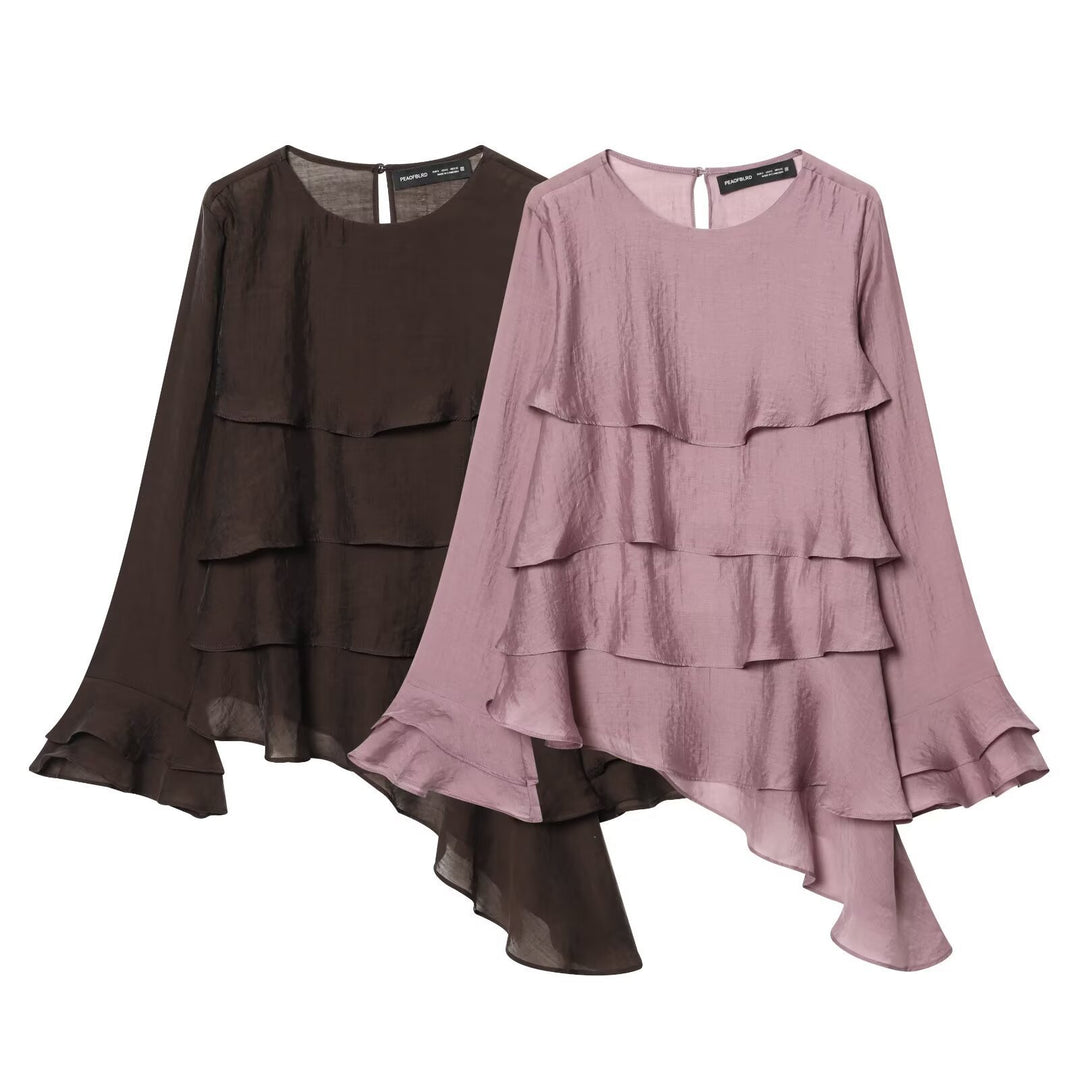 Dame asymmetrisk bluse med flæsedetaljer og elegant fald Skovae