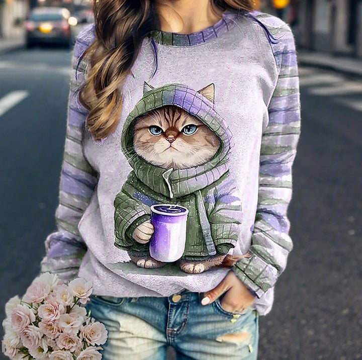 Damer med afslappet sweatshirt med stort kattefrontprint og stribede raglanærmer Skovae