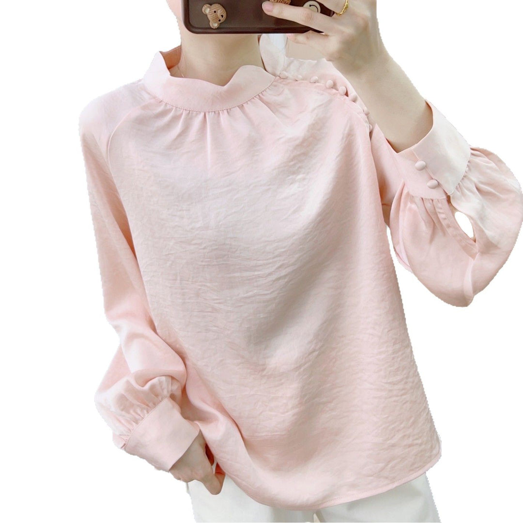 Damebluse med dekorative puffærmer og elegant ståkrave Stilla