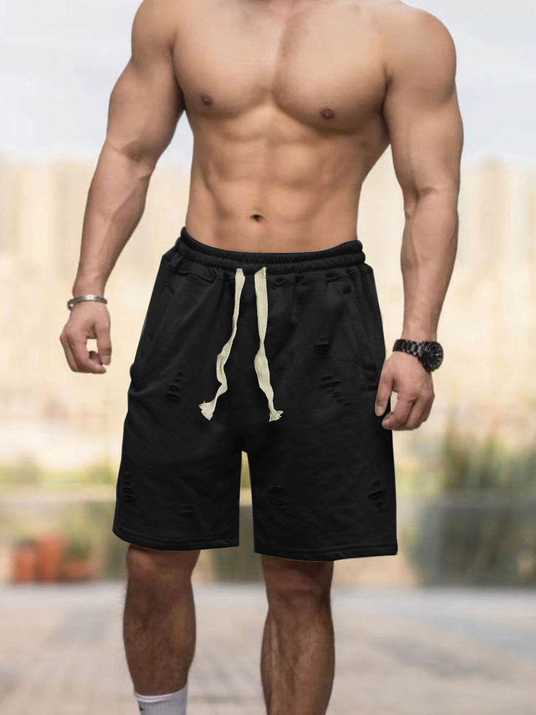 Herrer med afslappede sweatshorts med elastisk tunneltrækbånd, sidelommer og brugt-look Skovae