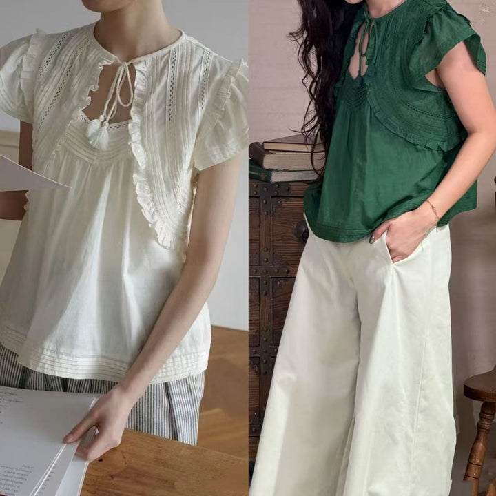 Damebluse med voluminøse ærmer og fine broderidetaljer Stilla