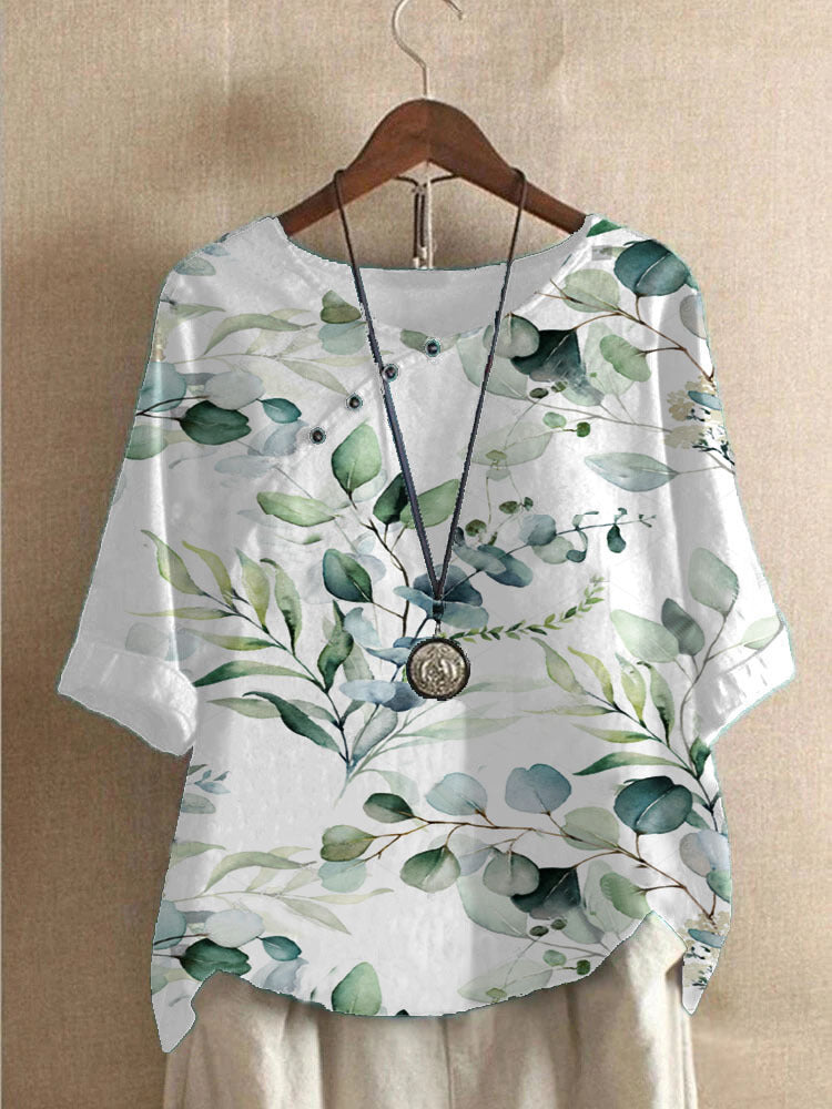 Damer bomuldsbluse med blomstertryk og elegant knaplukning Stilla