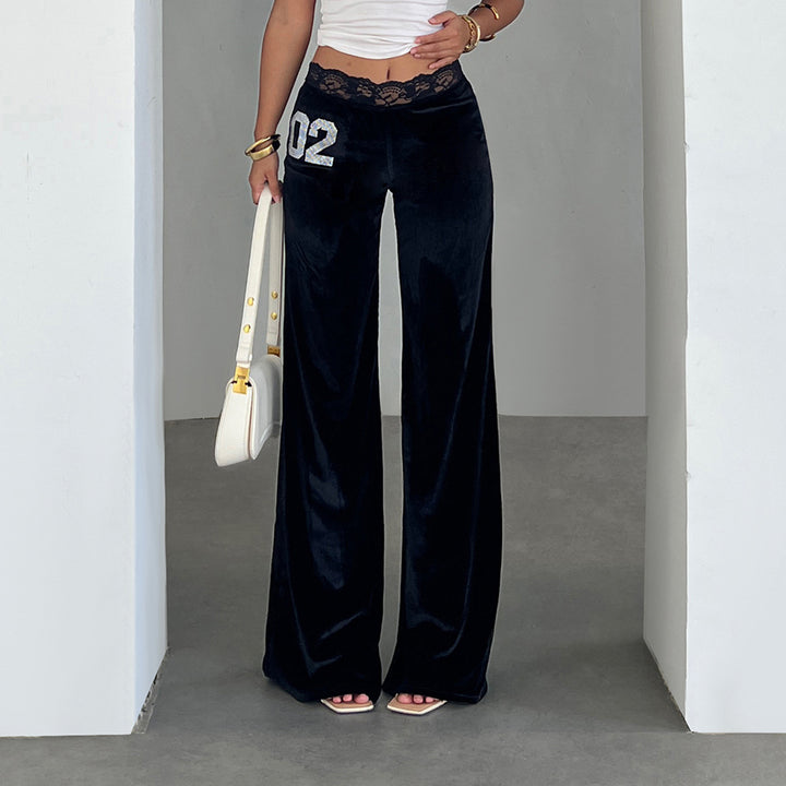 Damen elegante Flared-Hose aus weichem Material mit Spitzenbund und Glitzerakzenten Skovae