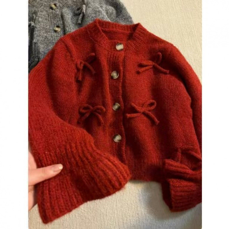 Kvinders cardigan med dekorative sløjfer på