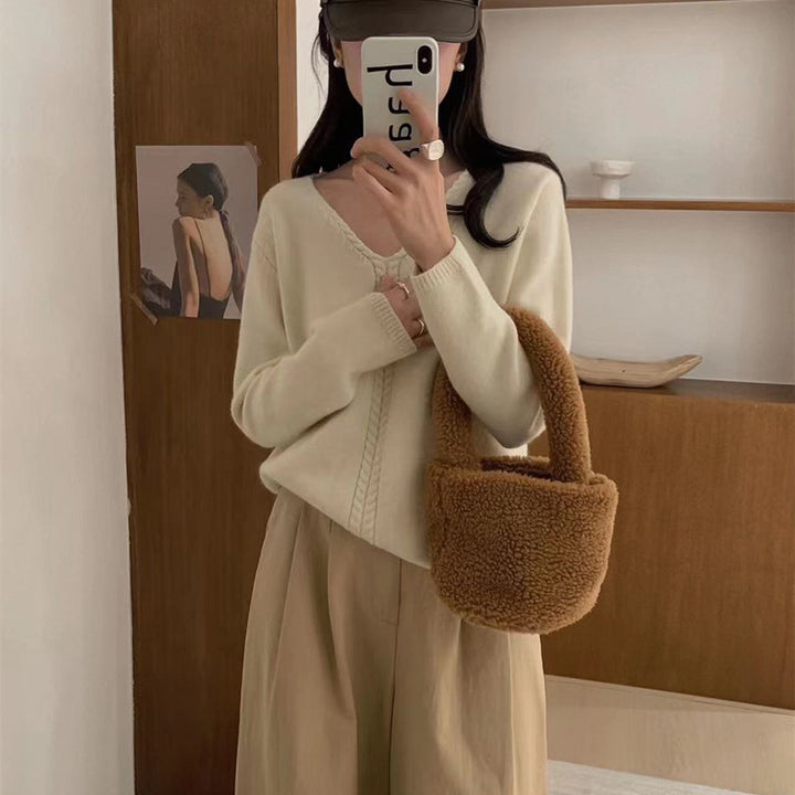 Kvinders oversized V-hals sweater med fint strikket tekstur Stilla