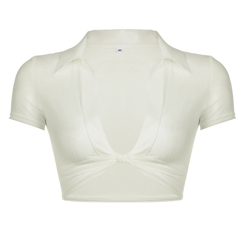 Dame cropped top med knude-design og dyb V-hals Skovae