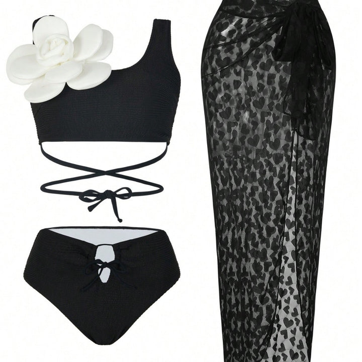 Dame bikini sæt med chic cover-up og trendy blomsterdetalje Stilla