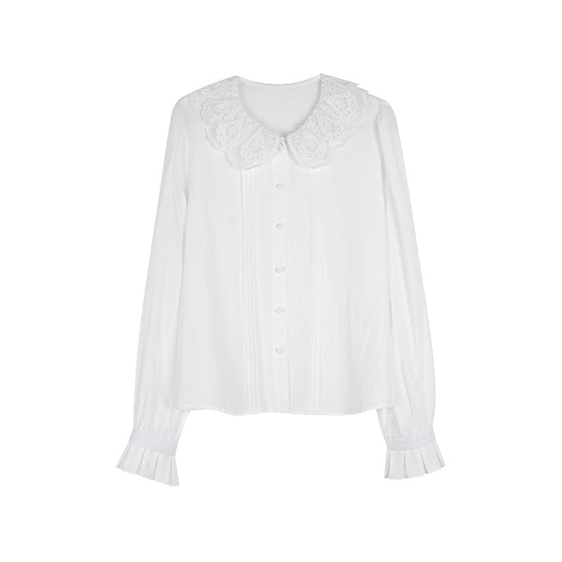 Damebluse med romantisk lacekrave og elegante flæseafslutninger Stilla