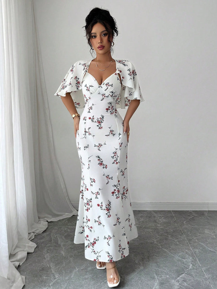 Dame maxikjole med elegante vinger og blomsterdesign Stilla