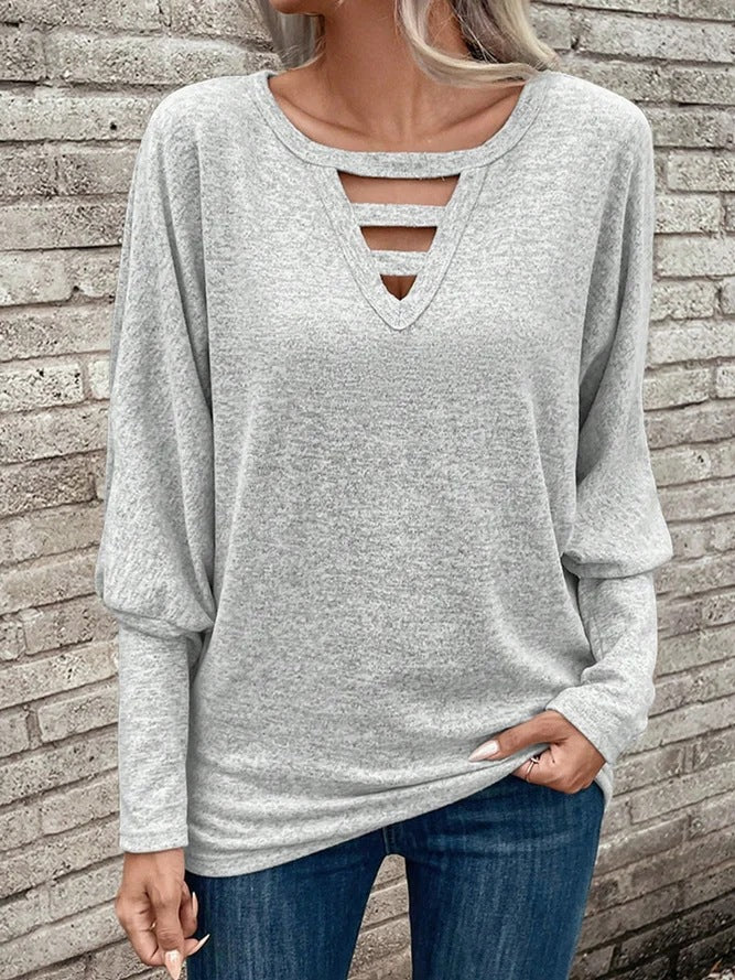 Dame afslappet sweater med dekorativ V-udskæring og cut-out-detaljer Stilla