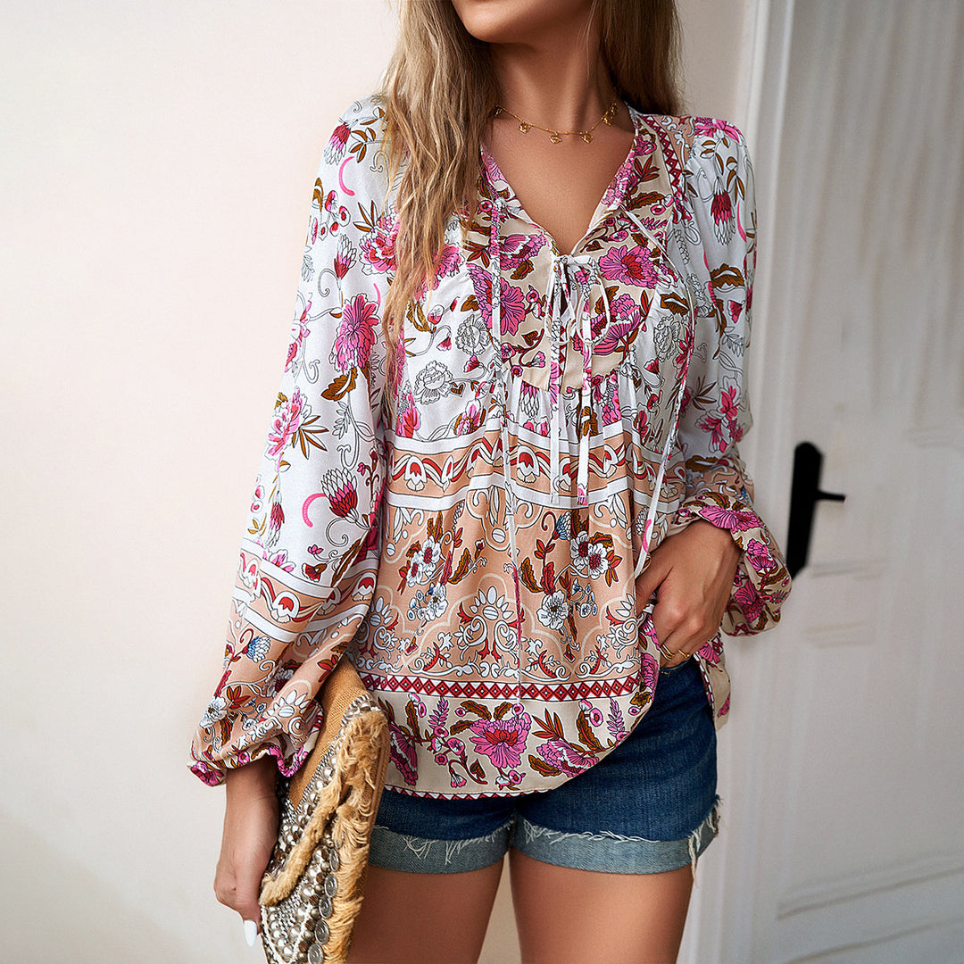 Dame longsleeve bluse med floralt design og elastiske ærmeafslutninger Stilla