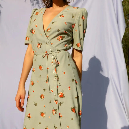 Damer sårkjole med floral mønster og elegant taljejustering Stilla