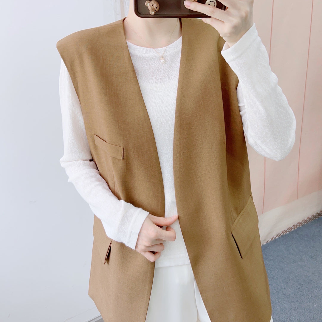 Dame elegant vest med minimalistisk design og praktiske lommer Stilla