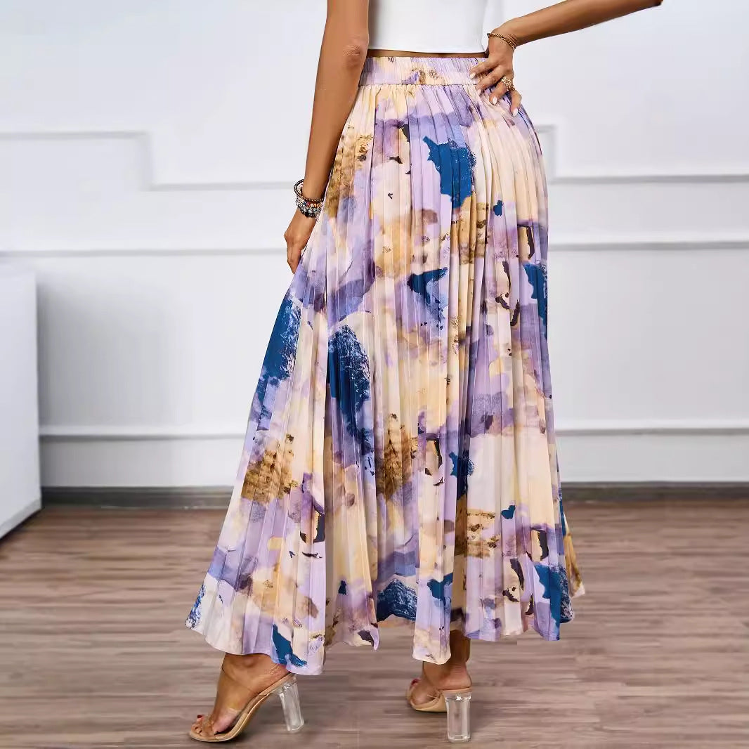 Dame maxi nederdel med plisserede detaljer og blomsterdesign Stilla