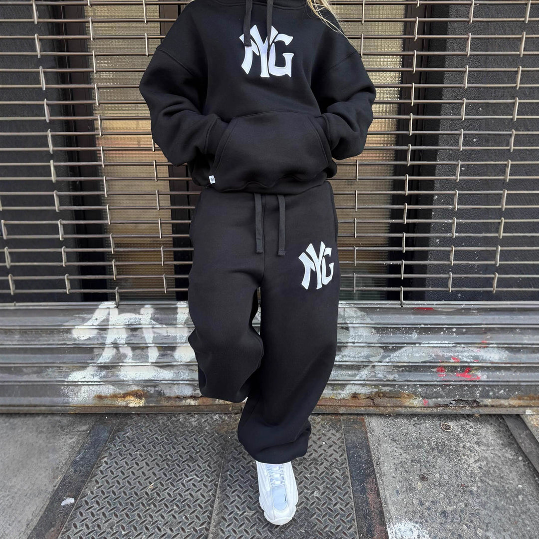 Unisex nan langt skåret hoodie sweatjakke med dobbeltsidet lynlås og logo-applikation Skovae