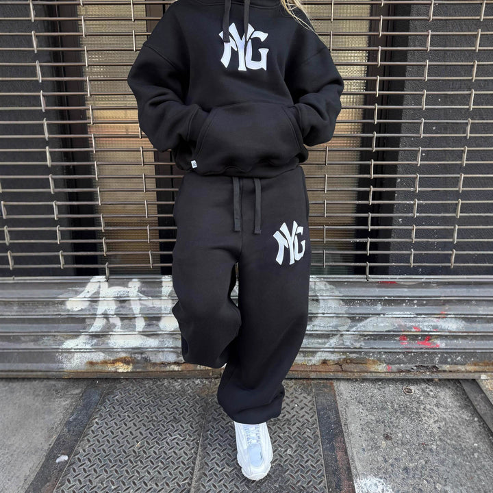 Unisex nan langt skåret hoodie sweatjakke med dobbeltsidet lynlås og logo-applikation Skovae