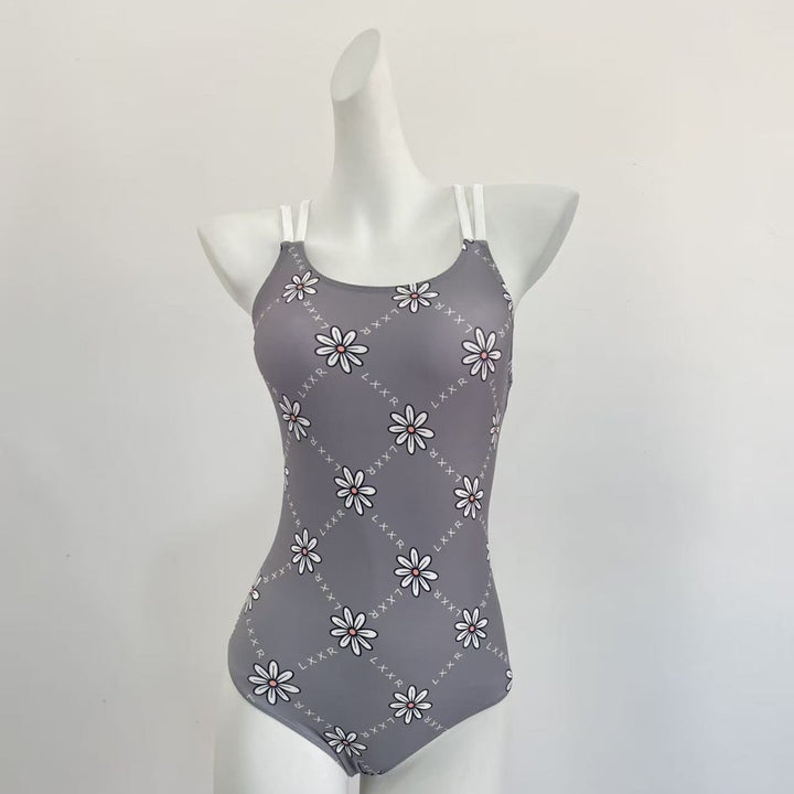 Dame one-piece badedragt med blomsterprint og justerbare stropper Skovae