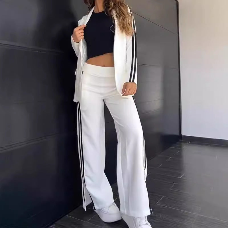 Dame nan sporty-elegante to-delt blazer-sæt med figursyet blazer og bred joggingbuks-snit med sideløjfer Skovae