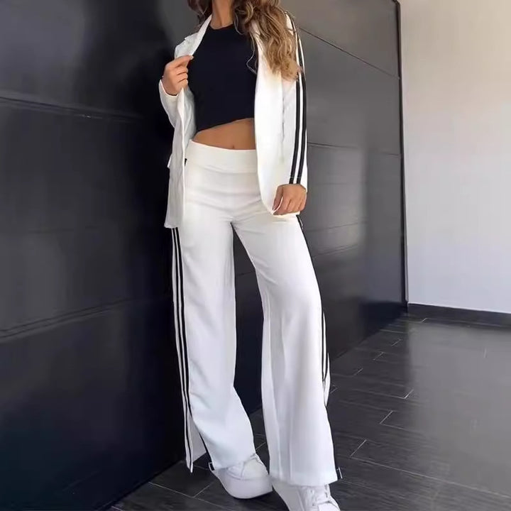 Dame nan sporty-elegante to-delt blazer-sæt med figursyet blazer og bred joggingbuks-snit med sideløjfer Skovae