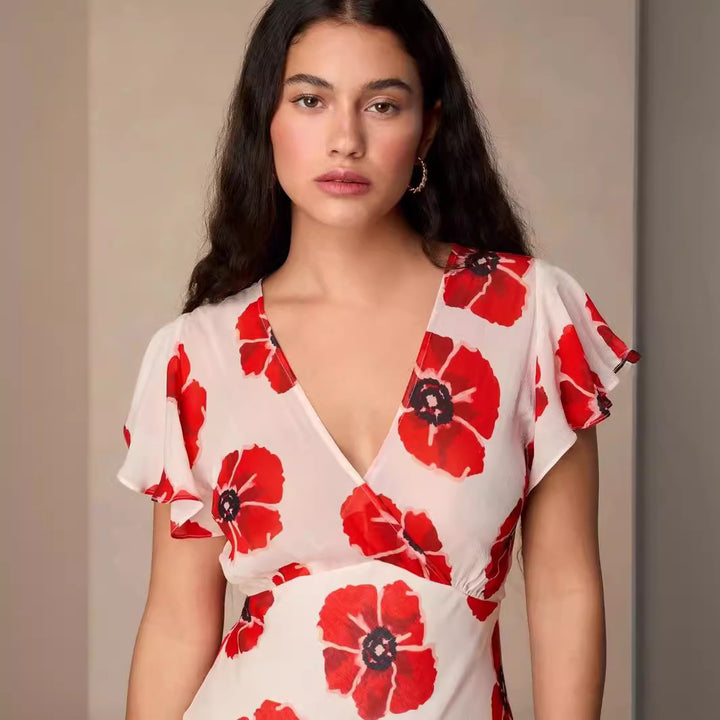 Dame maxikjole med floral design og elegant V-udskæring Stilla