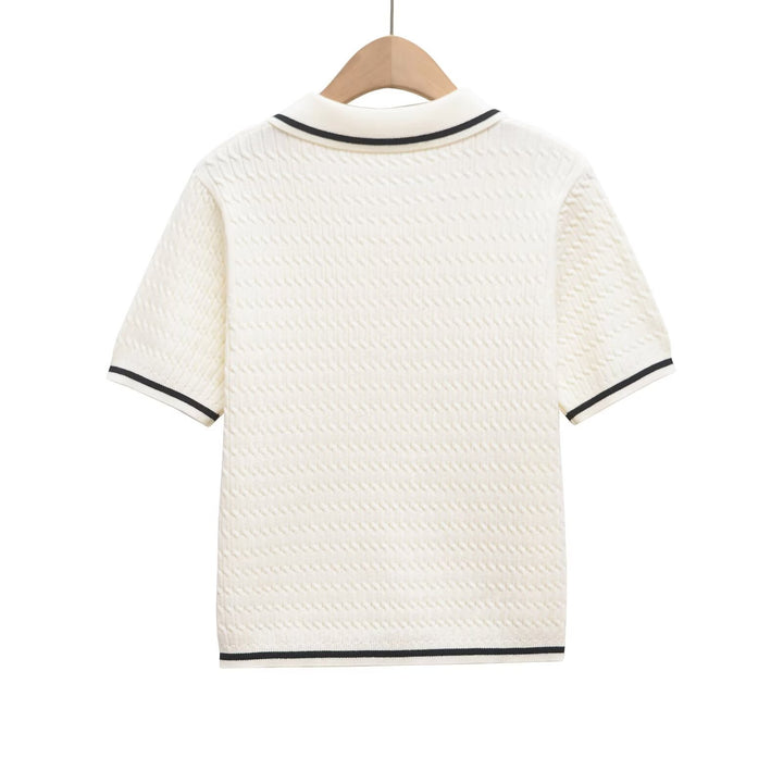Dame polo shirt med struktureret materiale og fine knapdetaljer Skovae