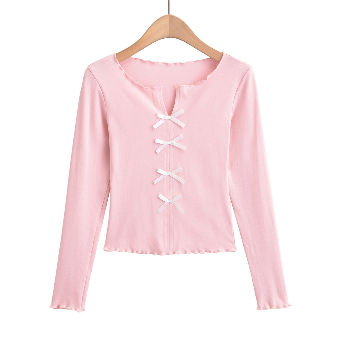 Dame elegant top med floral skæring og fine sløjfedetaljer Stilla
