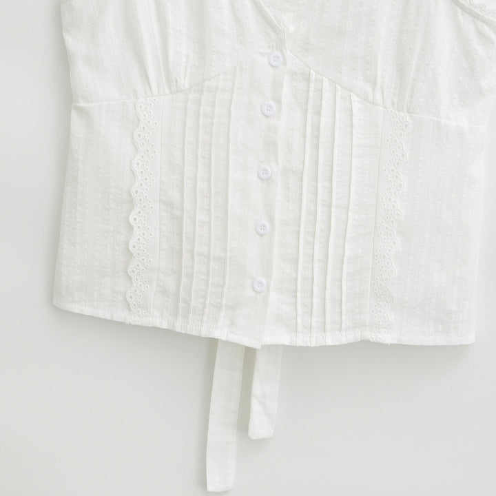 Dame Crop-Top med elegante flæsedetaljer og justerbar talje Stilla
