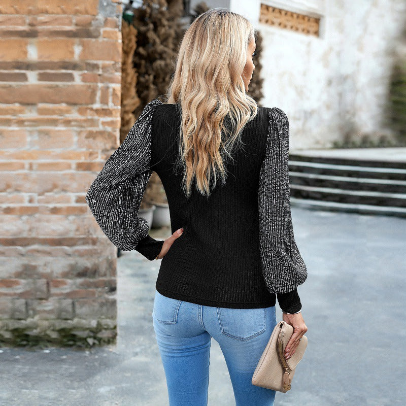 Dame Elegant top med fashionable puffærmer af netstof og fint ribdesign Stilla
