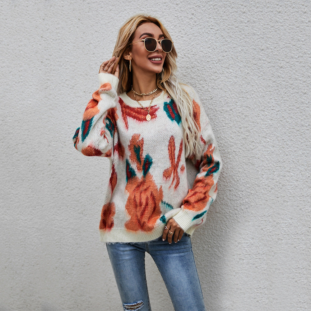 Kvindernes stilfulde sweater med blomster strikkemønster Stilla