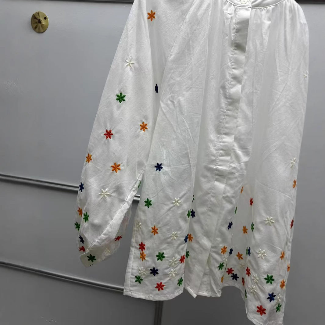 Damebluse med blomstermotiv og rynket ærme Stilla