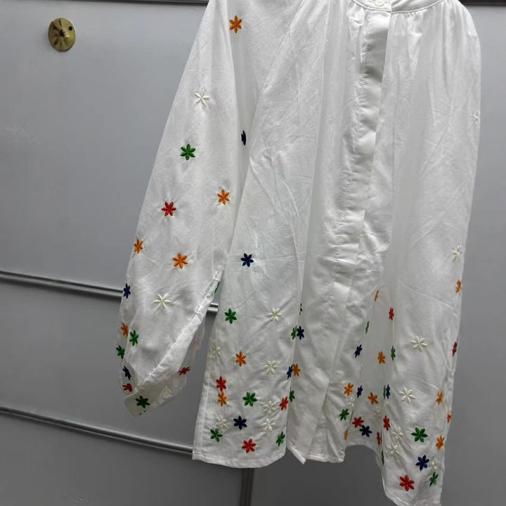 Damebluse med blomstermotiv og rynket ærme Stilla